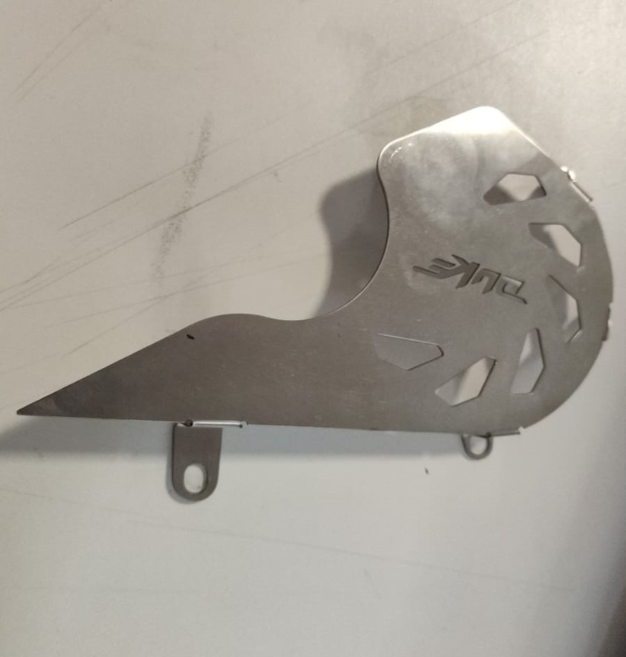 PROTECTOR DE PIÑON KTM/DUKE 200